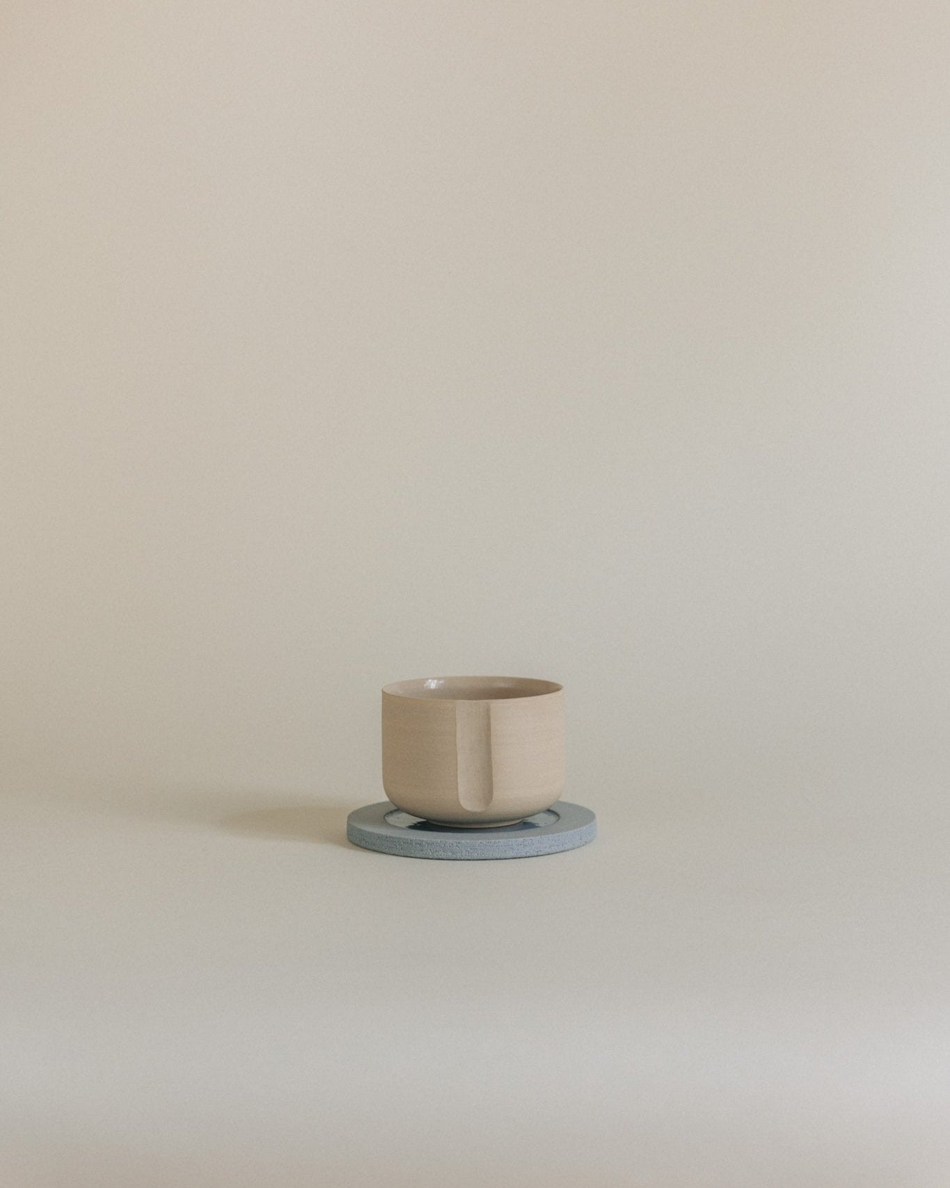 Carved cup in clay