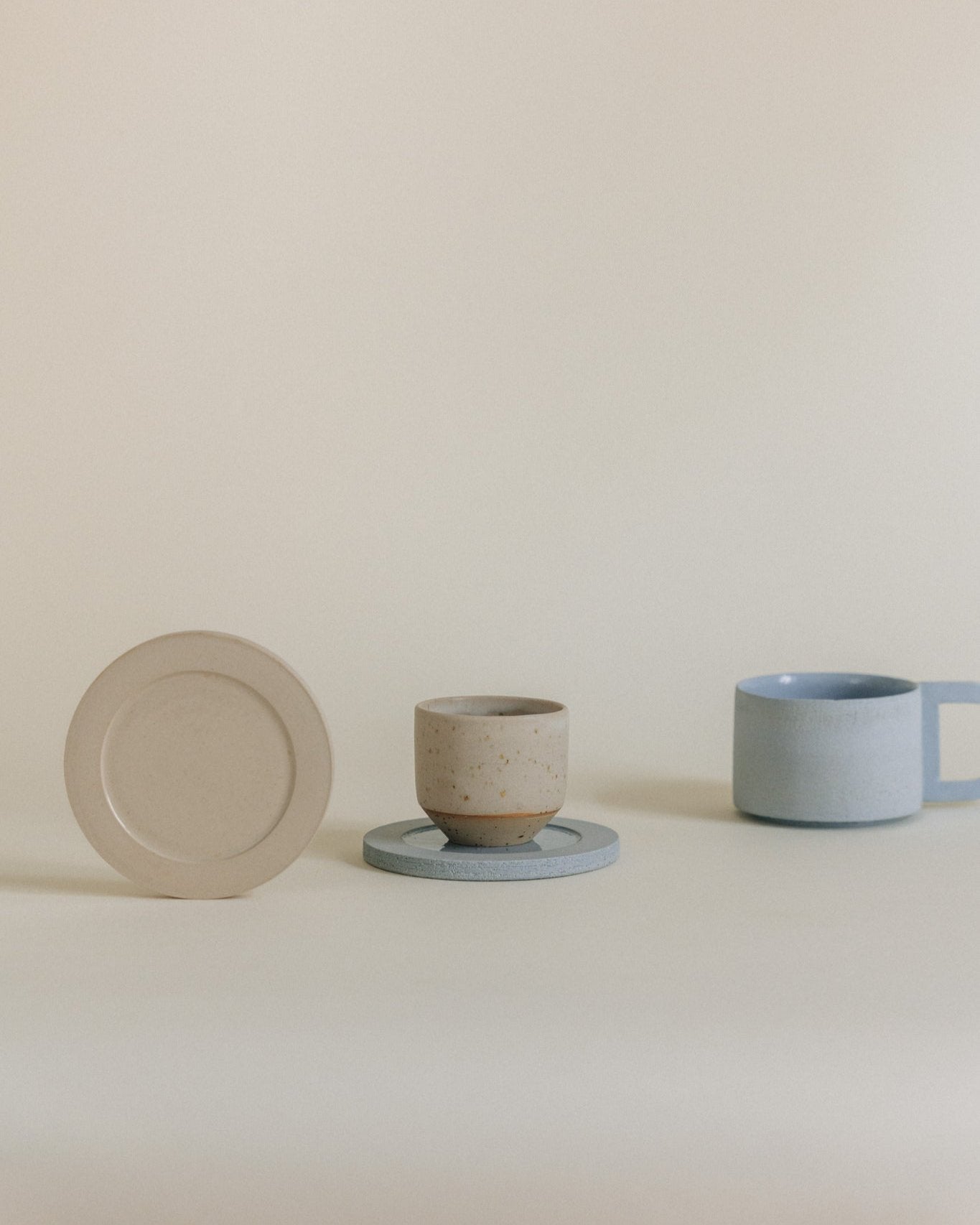 Espresso cup in sand