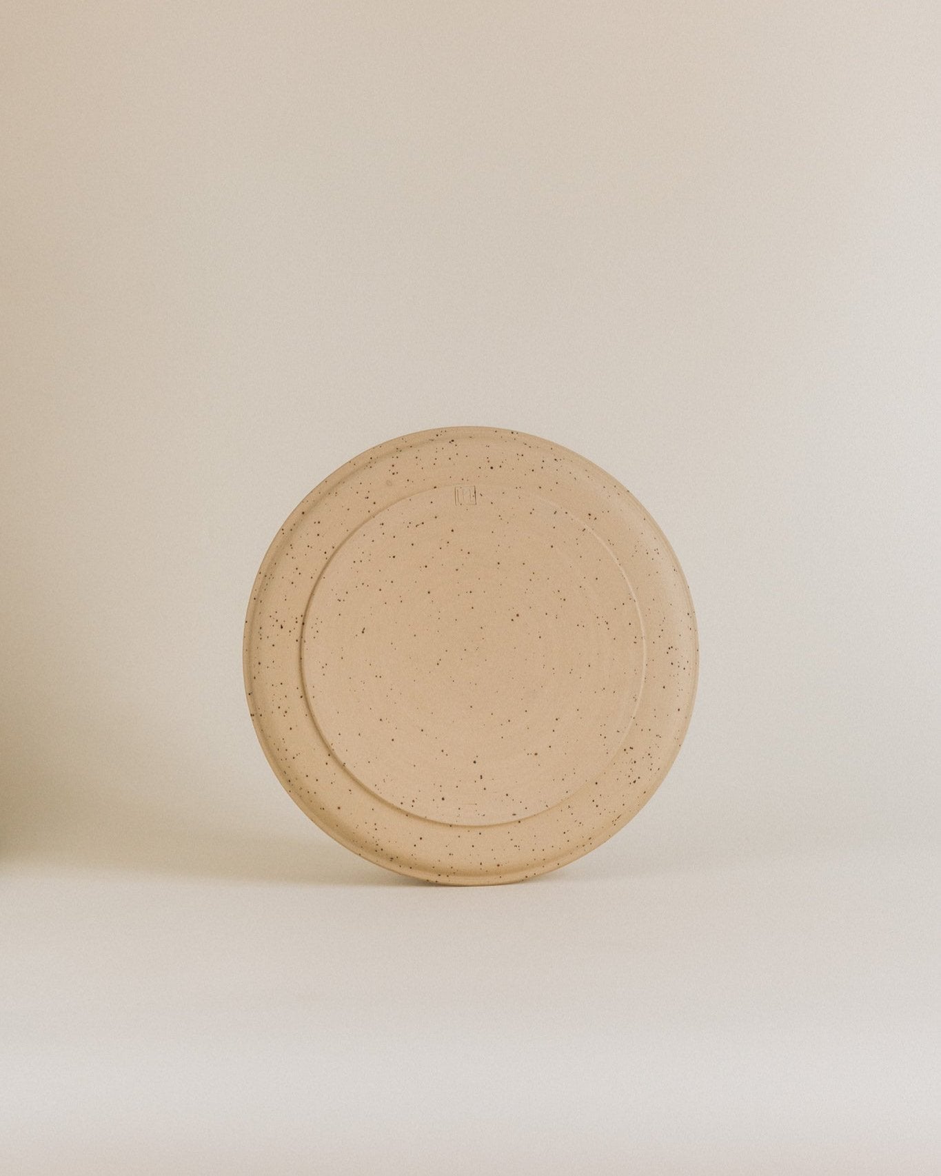 Plate L in sand