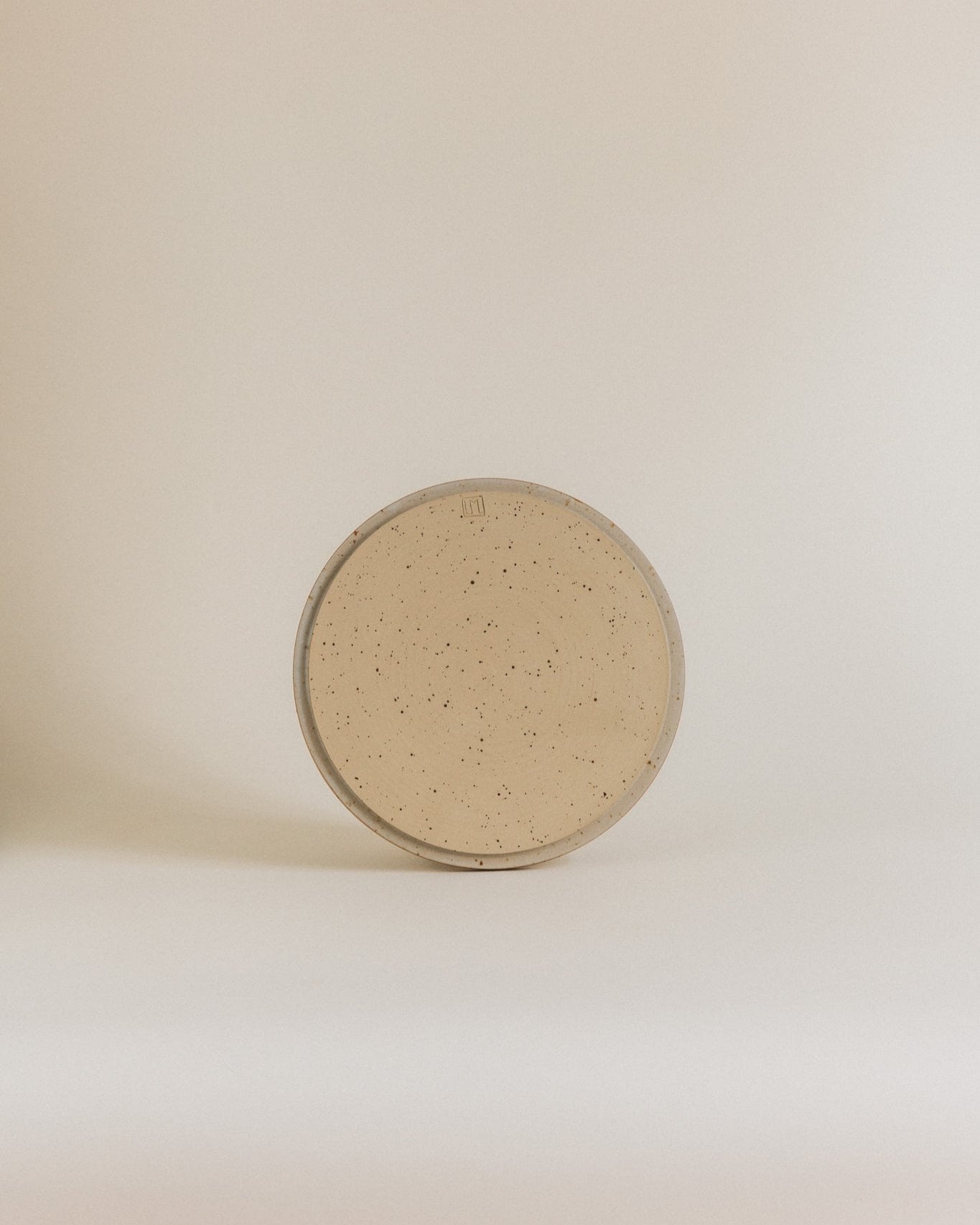 Plate M in sand