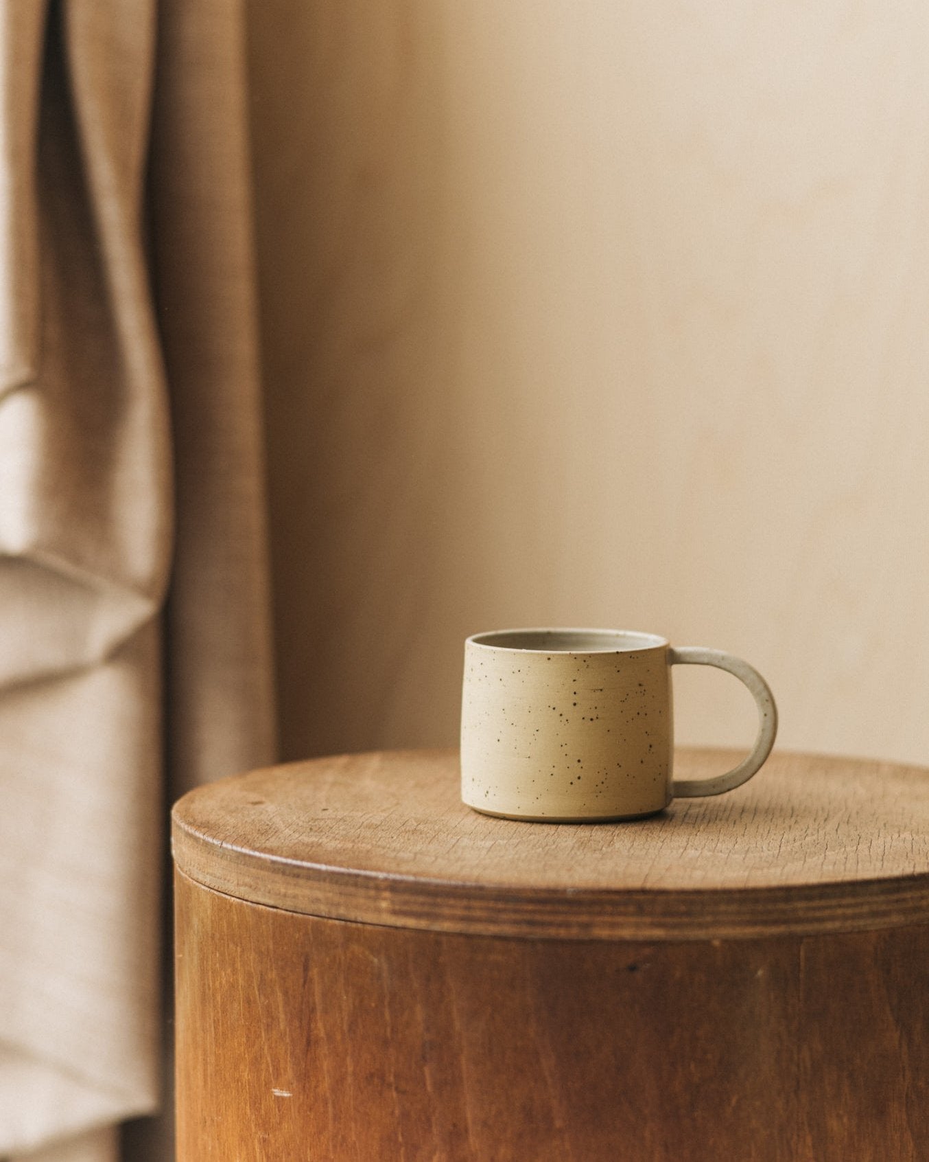 Simple mug in sand