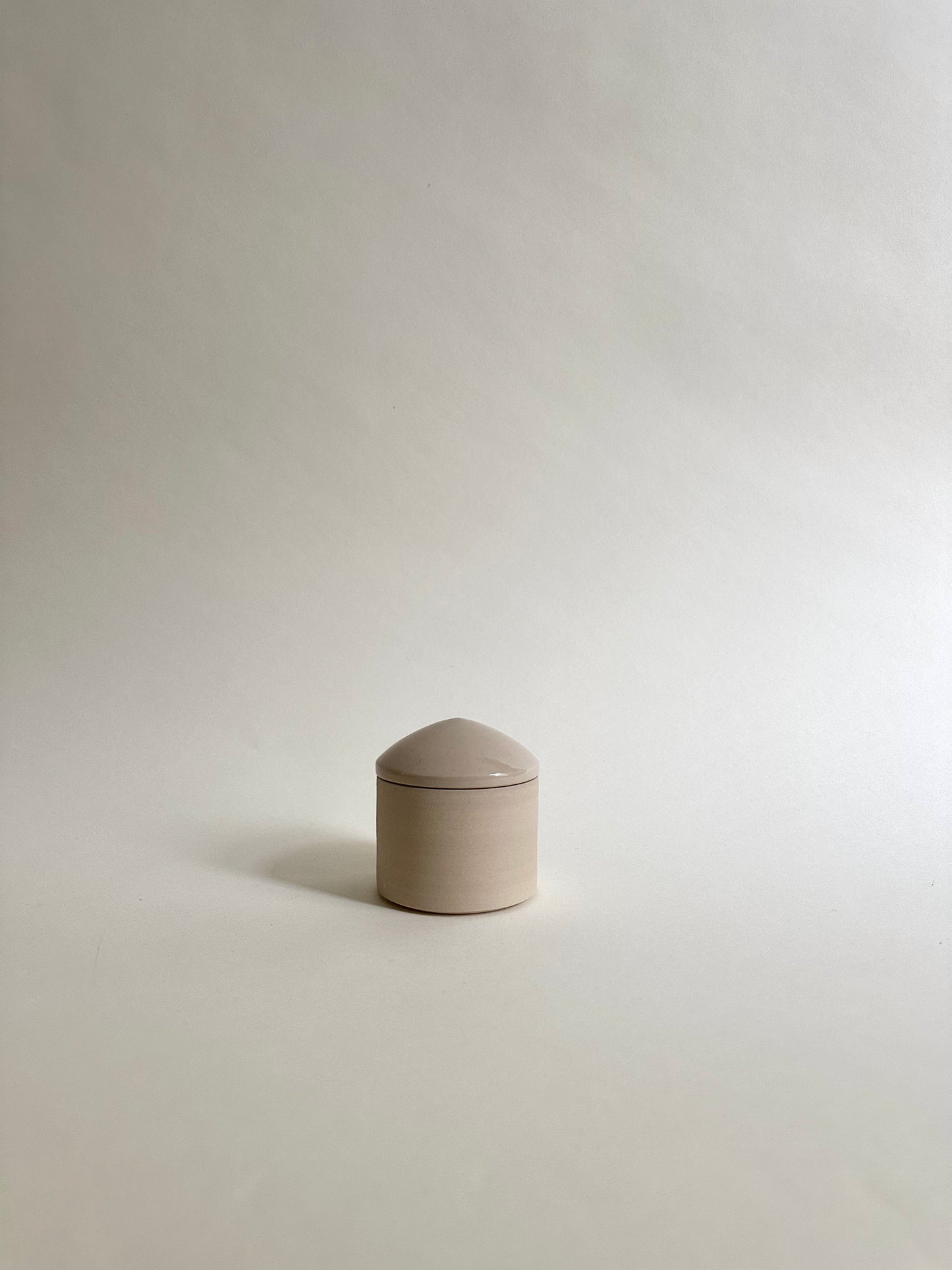 Lidded jar in clay