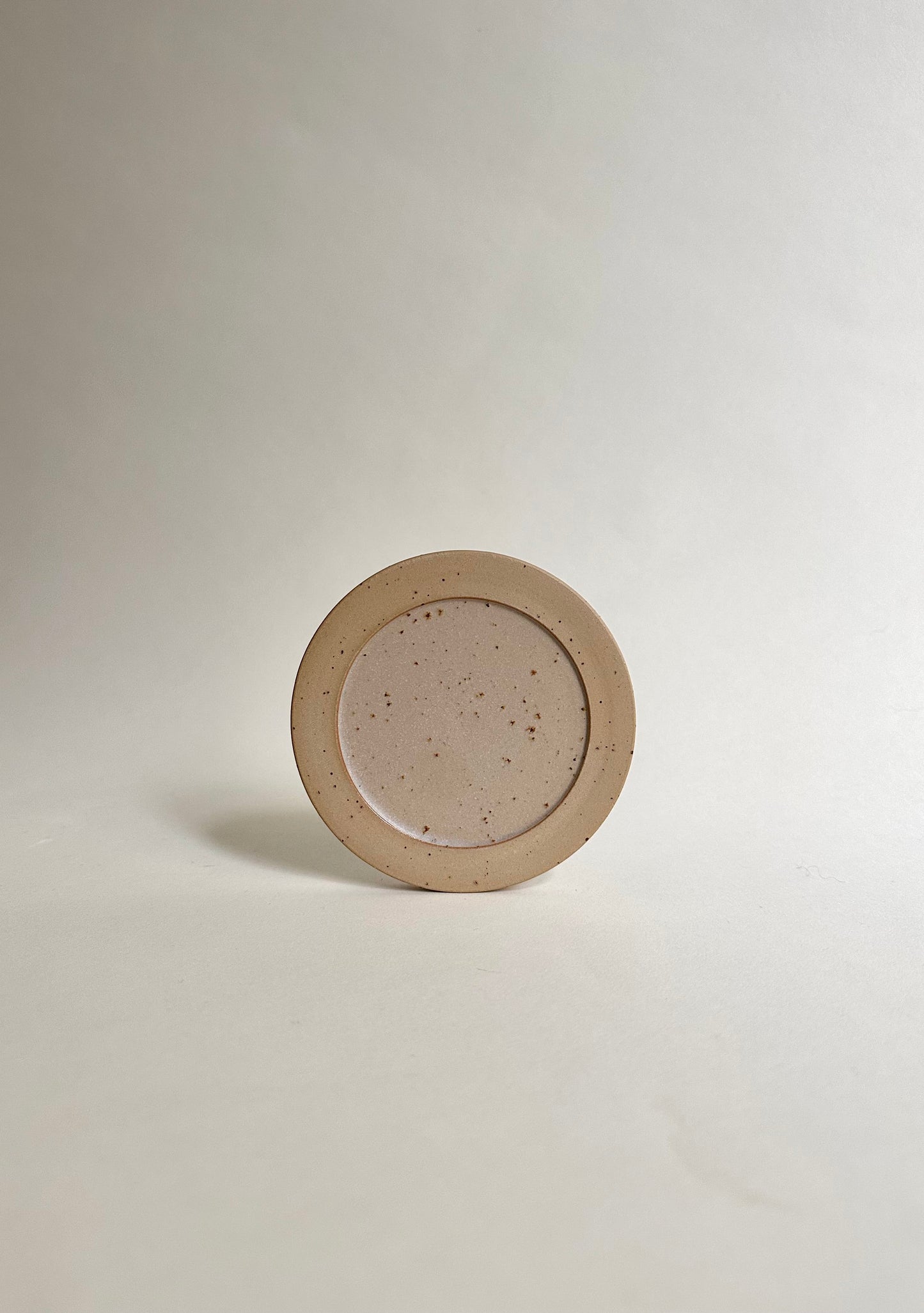 Coaster in sand
