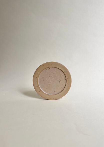 Coaster in sand