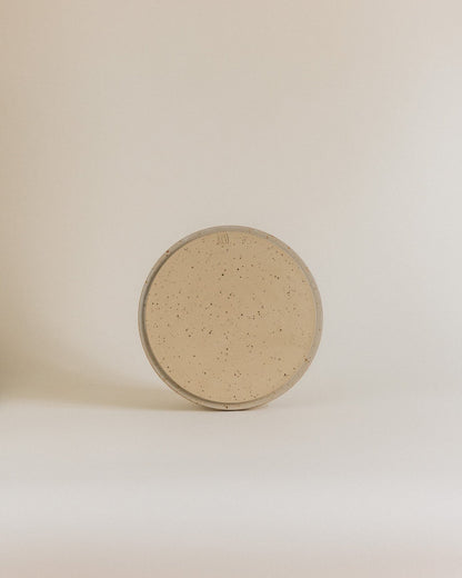 Plate M in sand