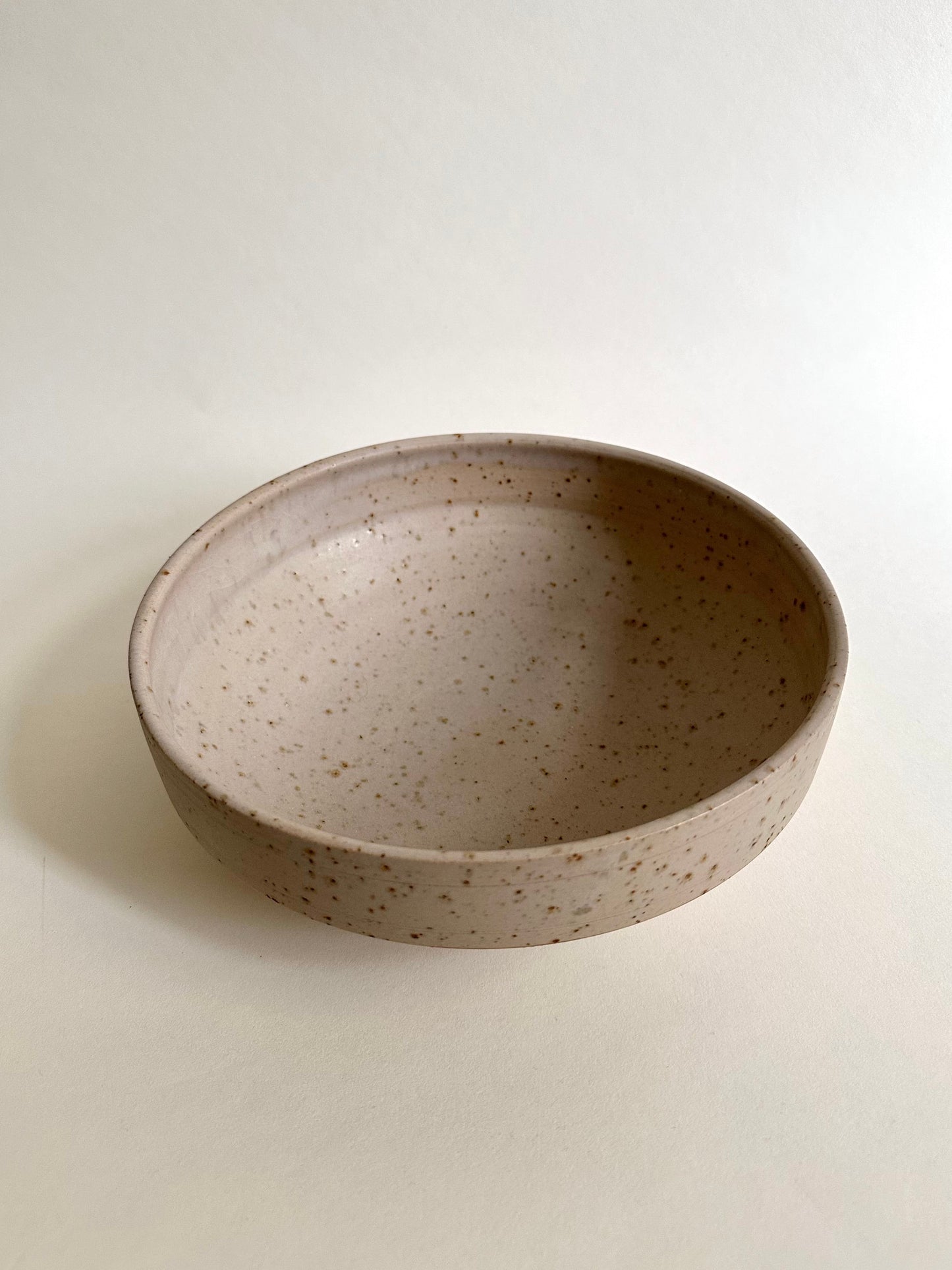 Salad bowl in sand