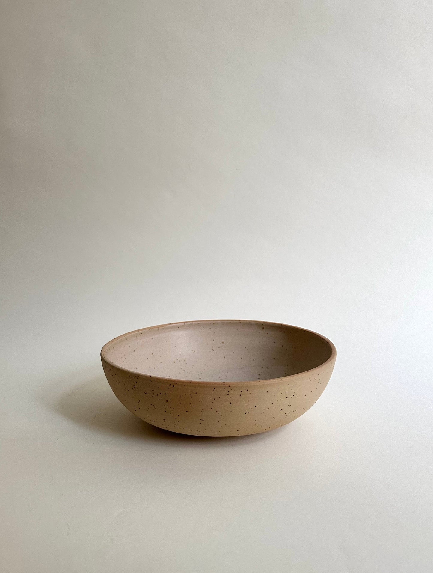 Salad bowl in sand