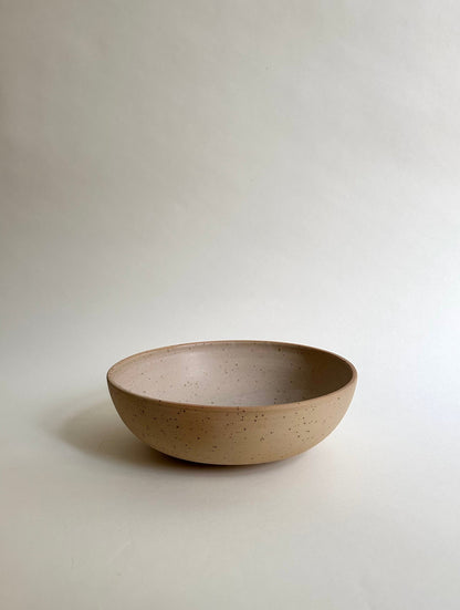 Salad bowl in sand