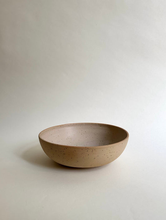 Salad bowl in sand