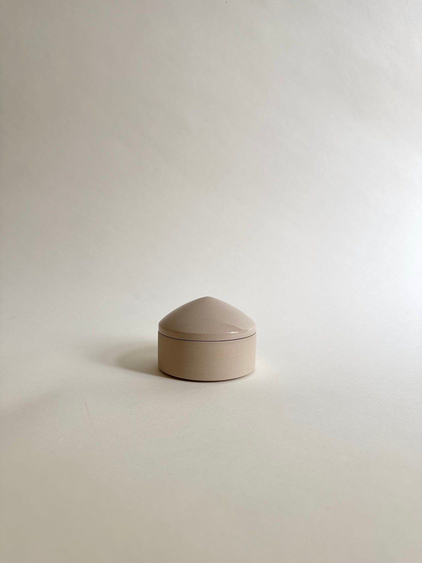 Lidded jar in clay