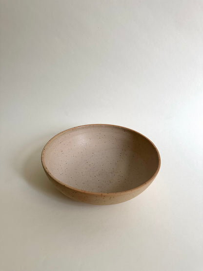 Salad bowl in sand